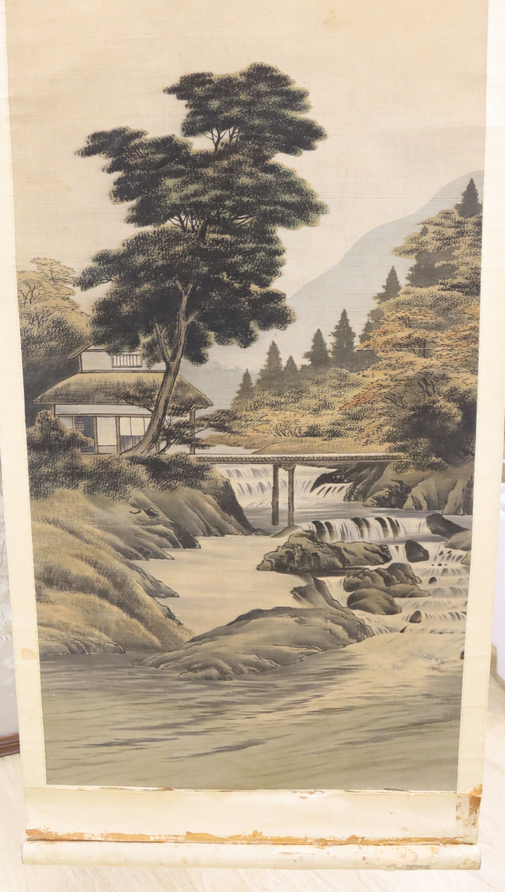 An early 20th century Japanese painted felt and watercolour landscape scroll